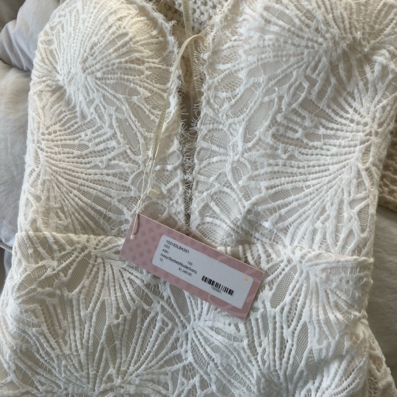 NEW wedding dress. With tags. - Picture 5 of 7